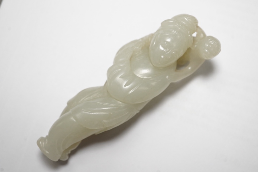 A Chinese white jade figure of a monkey trainer, 18th century